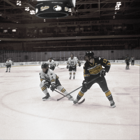 MTU vs. Lakehead. Photograph and colorization by Tim Peters